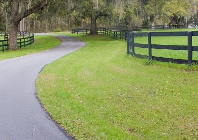 Paved path through Country Road Farm in Ocala, Florida.